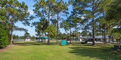 Park-landscape-with-sign-and-trees